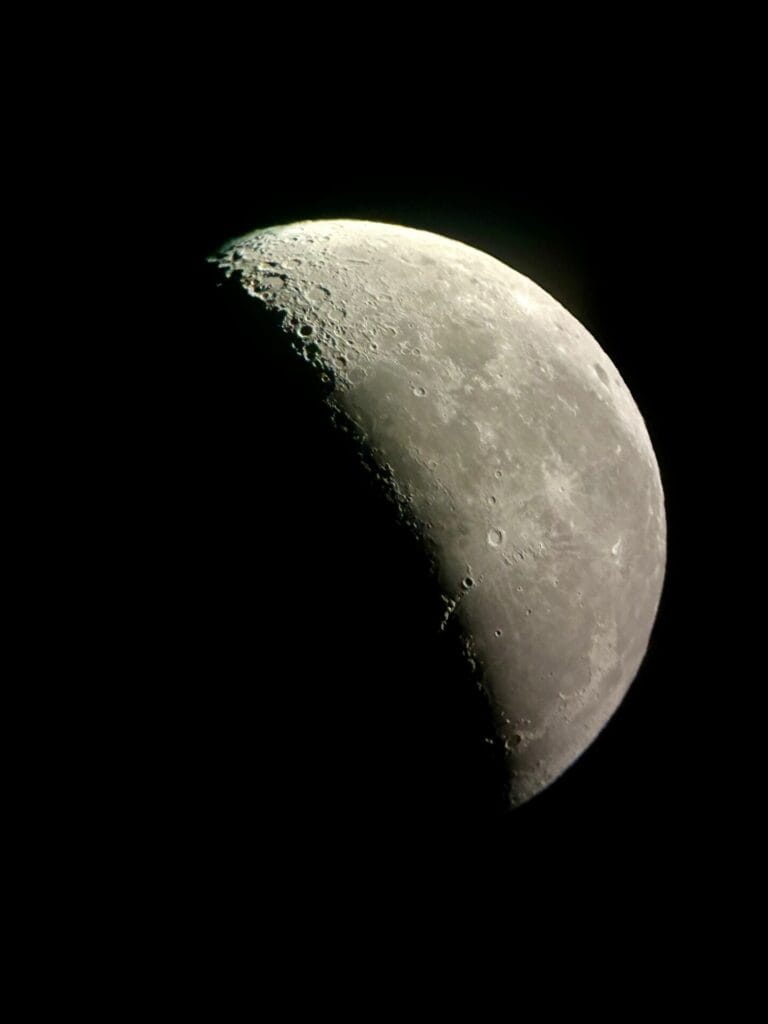 the moon in half shadow